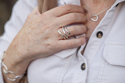 Close-up of a person wearing Irish handcrafted sterling silver jewellery